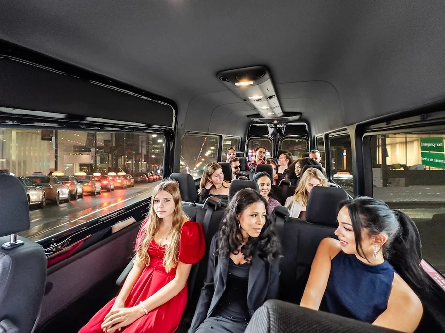 14 passenger shuttle van passengers inside