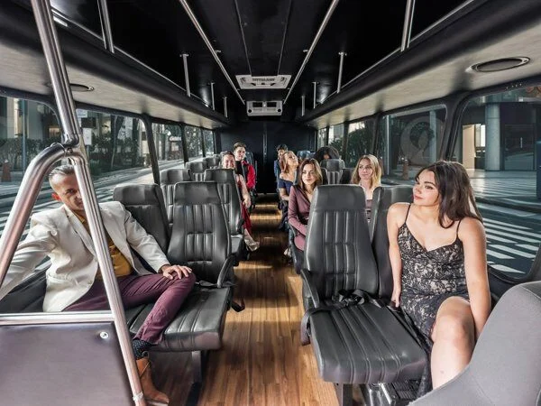 24 passenger shuttle bus interior with passengers
