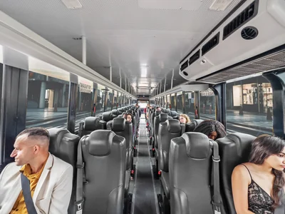 40 passenger shuttle bus with passengers