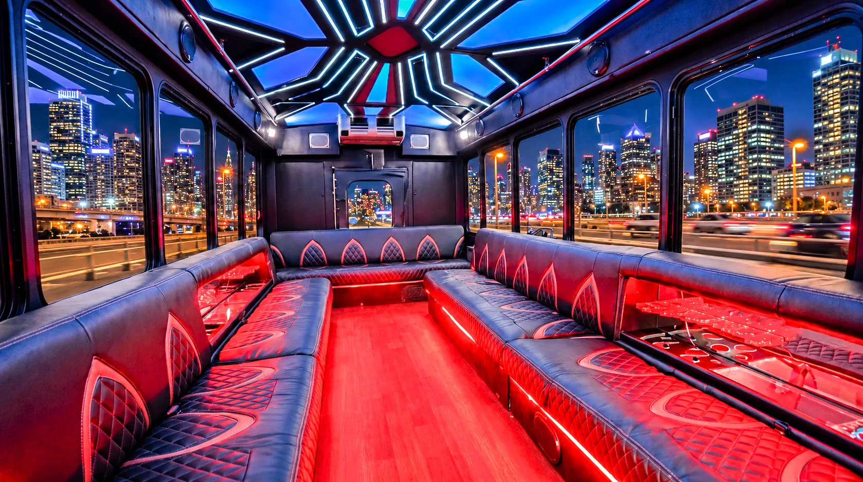 image of 28 passenger white Party Bus interior taken from front passenger side bench seat